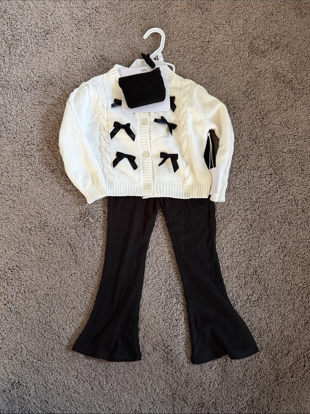 Girls Cream Cardigan with Black Bow Accents and Black Pants Set